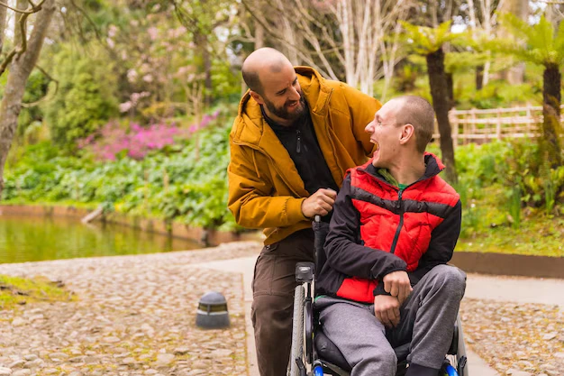 ndis man on wheelchair having fun